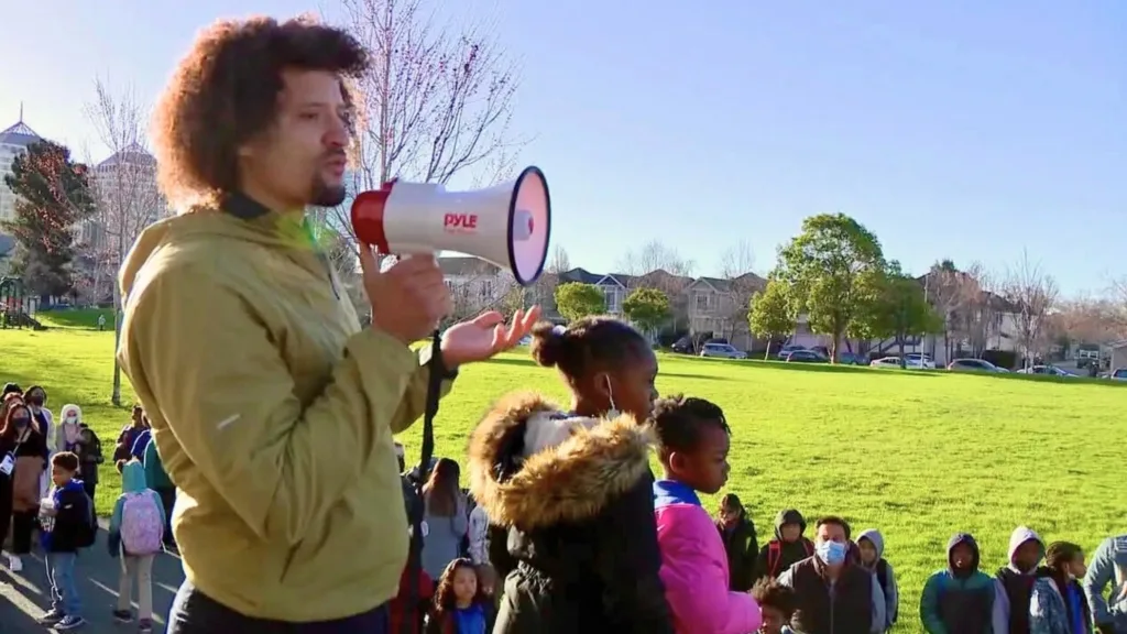 A Conversation with Michael Burks, CEF’s Director of School Partnerships 2 Michael Burks in a park holding a megaphone
