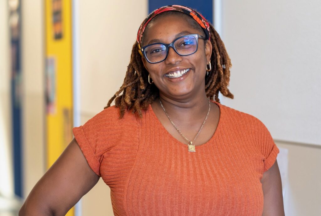 Zharia Harper smiles as she poses for a photo.
