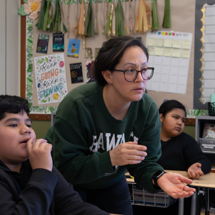 Educator Teaching Class With Students